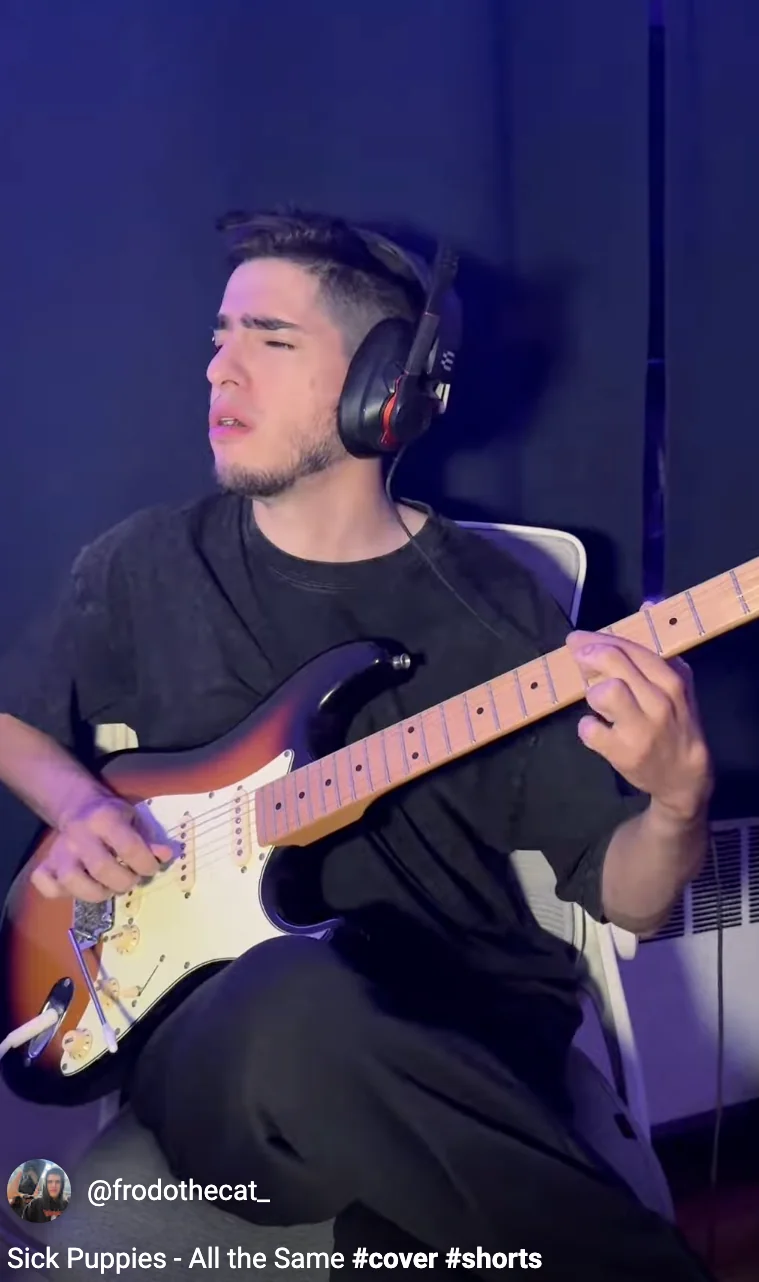 Renilson playing guitar for an Instagram cover